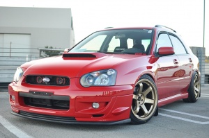 2004 Subaru Impreza WRX with 18x9.5 Rota Grid wheels