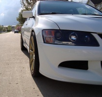 2005 Mitsubishi Lancer Evolution with 18x8.5 Work Emotion XC-8 wheels