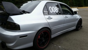 2006 Mitsubishi Lancer Evolution with 18x9 Buddy Club P1 SF wheels