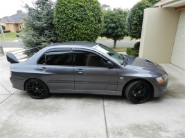2006 Mitsubishi Lancer Evolution with 18x8.5 Enkei GTC01 wheels