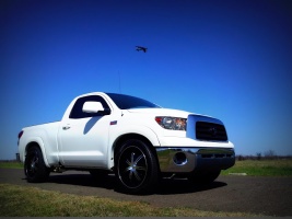 2011 Toyota Tundra with 22x9.5 KMC Surge wheels