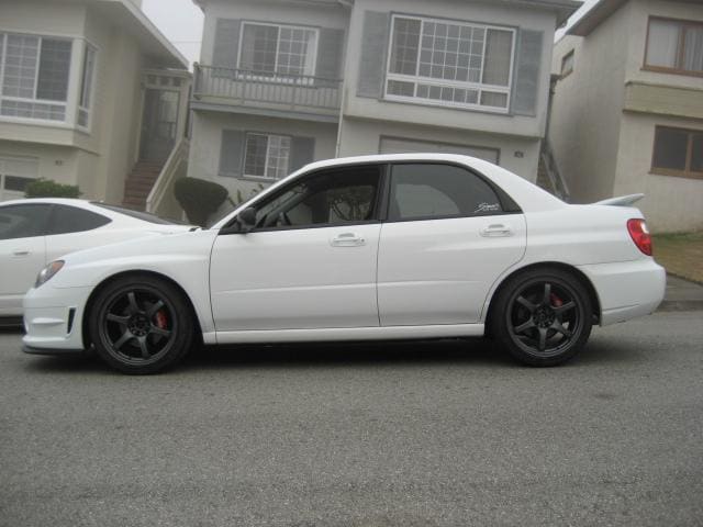 2006 Subaru Impreza WRX with 18x8.5 Rays Engineering Gram Lights 57Maximum wheels