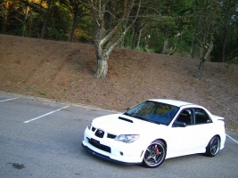 2006 Subaru Impreza WRX with 18x9.5 Rays Engineering G-games 77 Wolf wheels