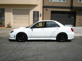 2006 Subaru Impreza WRX with 18x8.5 Rays Engineering Volk Racing CE28n wheels