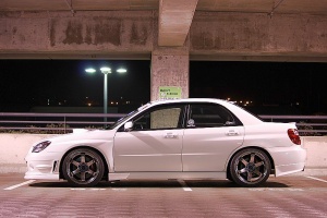 2006 Subaru Impreza WRX with 18x10 Rota Grid wheels