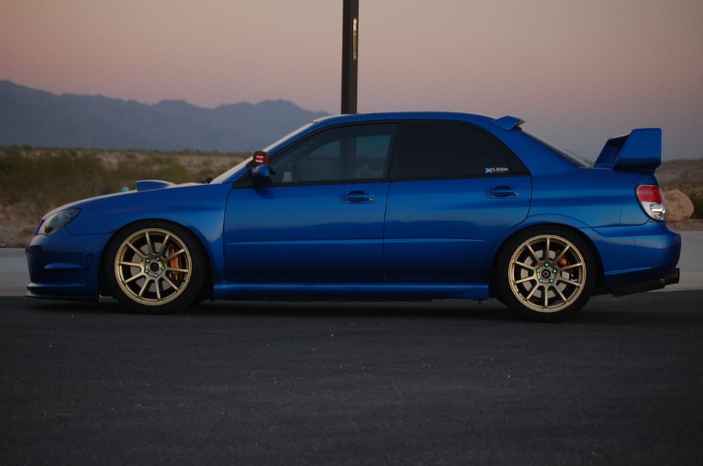 2007 Subaru Impreza WRX STi with 18x9 Rota G-Force wheels