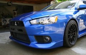 2010 Mitsubishi Lancer Evolution with 18x10.5 Enkei NT03 wheels