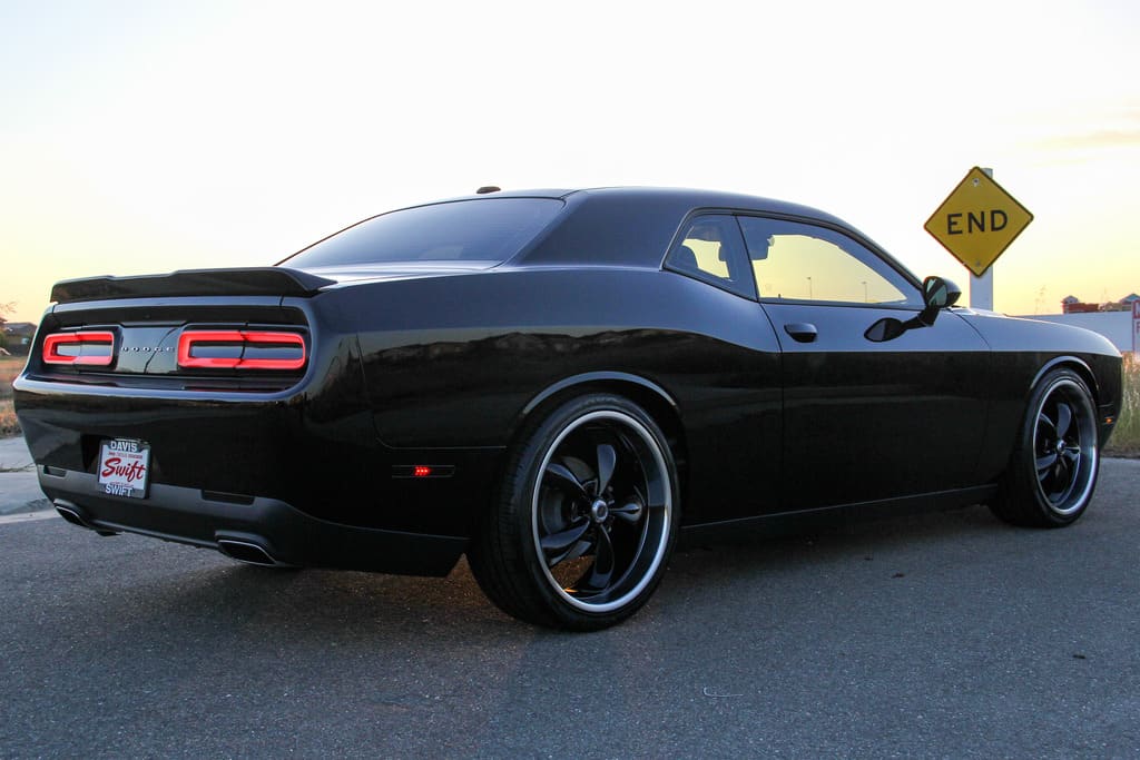 2015 Dodge Challenger with 22x9.5 American Racing Torq Thrust M wheels