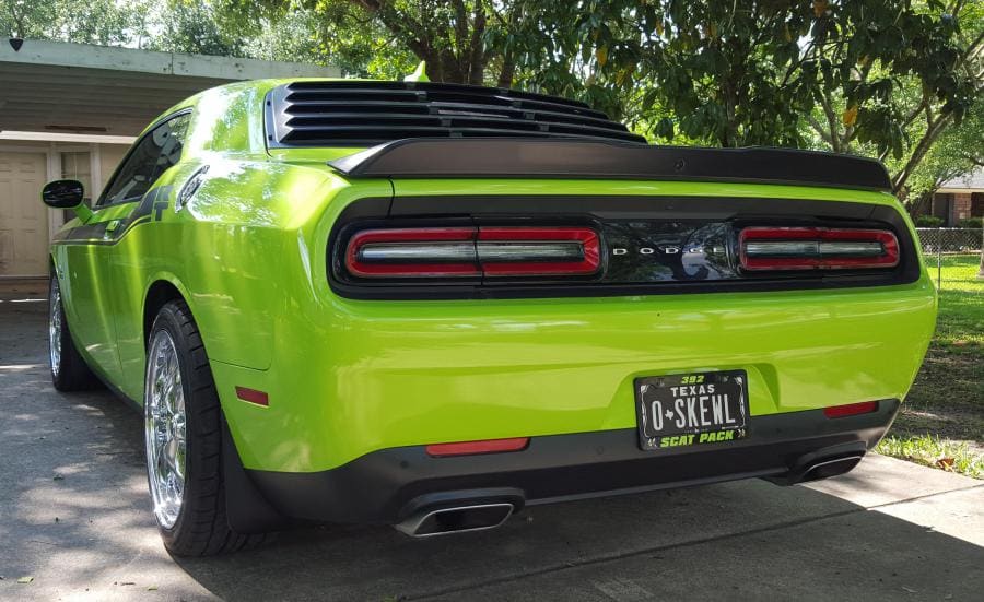 2015 Dodge Challenger with 20x8.5 American Racing Torq Thrust M wheels