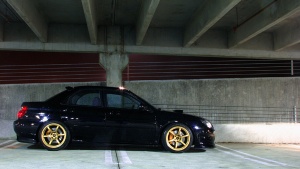 2006 Subaru Impreza WRX STi with 18x9 Rota Boost wheels