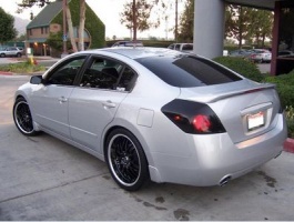2009 Nissan Altima with 20x9 wheels