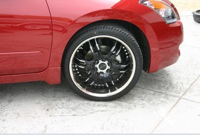 2009 Nissan Altima with 20x8.5 Elite Carnal Black wheels