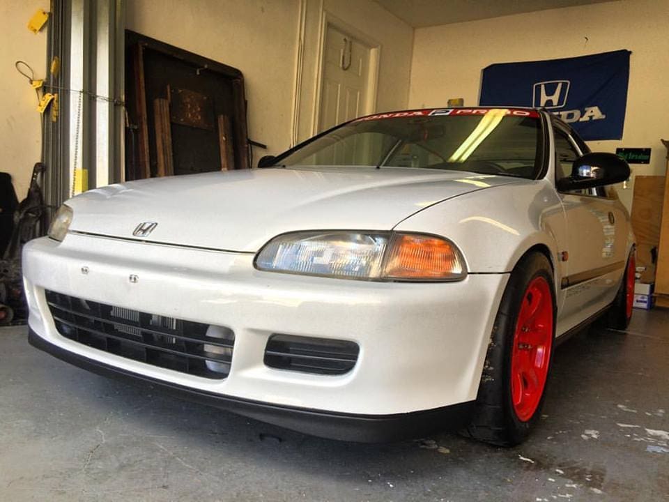 2005 Honda Civic with 15x8 RAYS Gramlights wheels