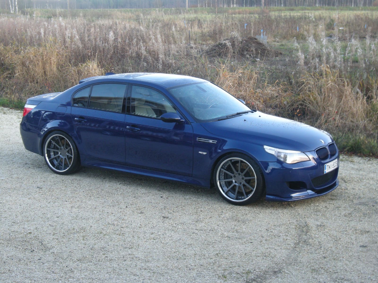 2010 BMW M5 with 20x9.5 Rennen R10 wheels