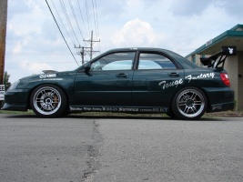 2005 Subaru Impreza WRX STi with 18x10.5 Enkei RPF-1 wheels