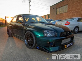 2005 Subaru Impreza WRX STi with 18x9.5 Enkei NTO3+M wheels