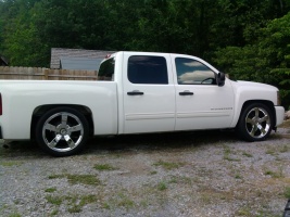 2009 Chevrolet Silverado 2500HD with OEM Chevrolet SS Replica wheels