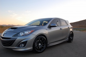 2010 Mazda Mazda3 with 18x8 Advan Rz wheels
