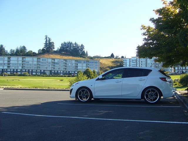 2010 Mazda Mazda3 with 18x8 Buddy Club racing p1 wheels