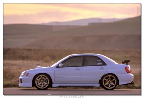 2002 Subaru Impreza WRX with 18x9.5 Rota Grid wheels