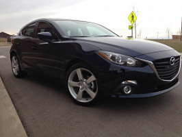 2014 Mazda Mazda3 with 18x8 OEM Mazda RX-8 wheels