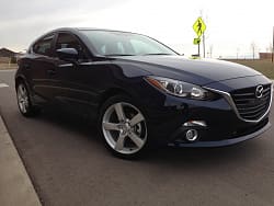 2014 Mazda Mazda3 with 18x8 OEM Mazda RX-8 wheels
