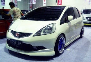 2009 Honda Fit with 16x8.5 Work Meister S1 wheels