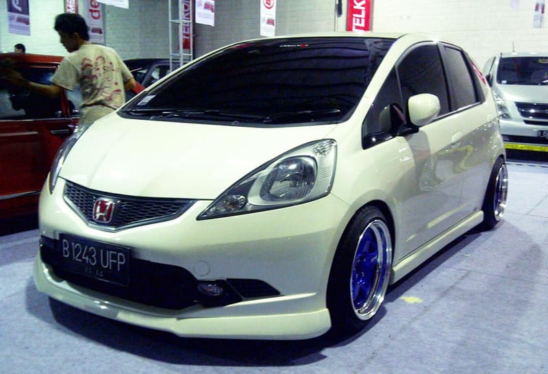 2009 Honda Fit with 16x8.5 Work Meister S1 wheels