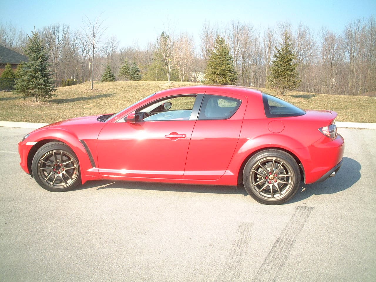 2008 Mazda RX-8 with 18x8.5 Work Emotion wheels