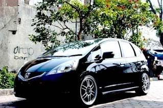 2009 Honda Fit with 18x8.5 Enkei RPF1 wheels