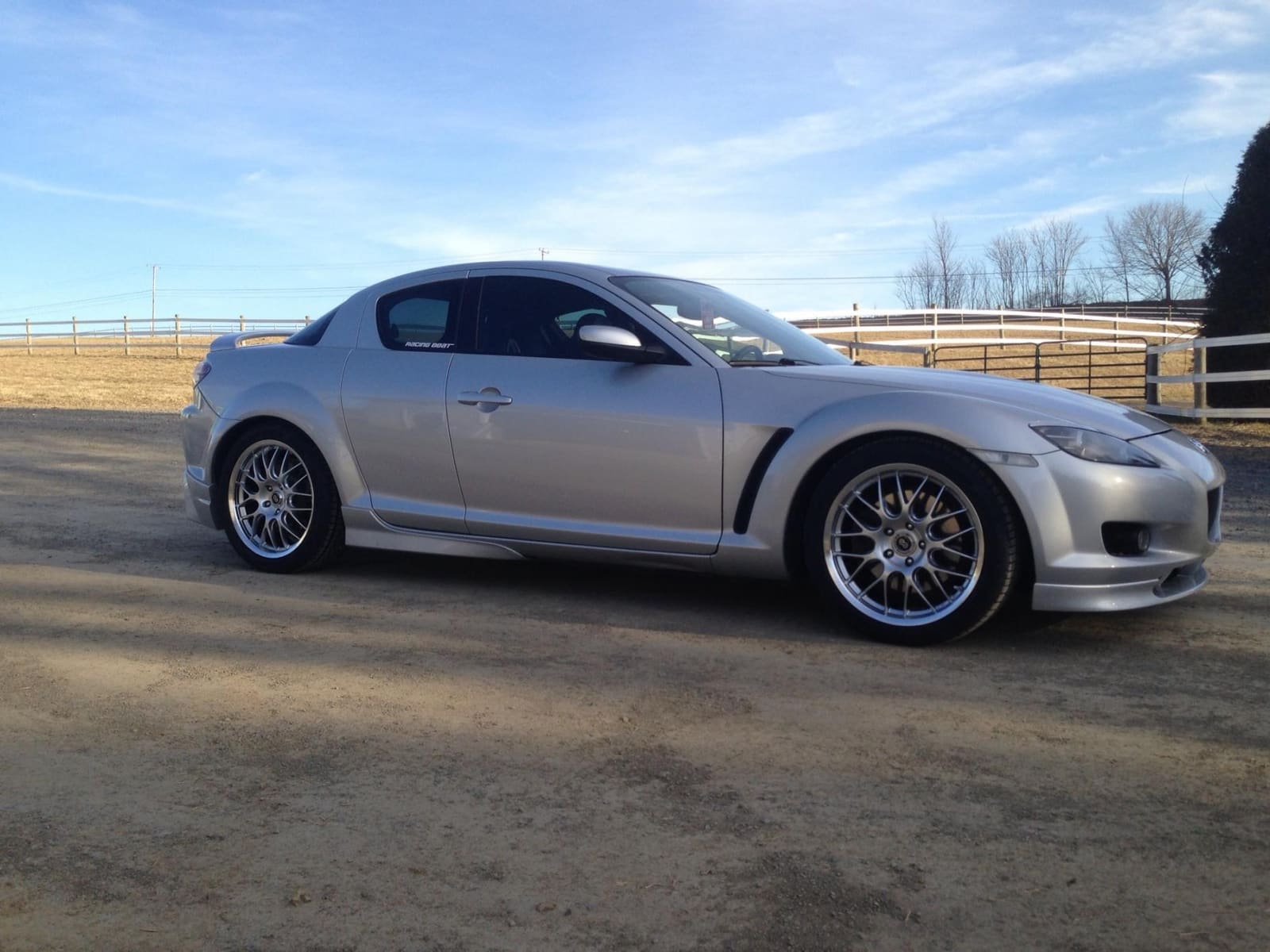 2008 Mazda RX-8 with 18x8 Enkei Lusso wheels