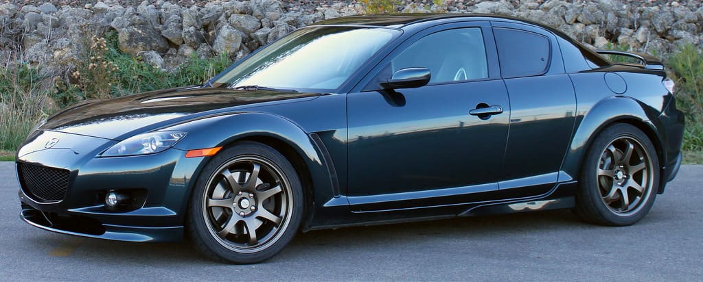 2009 Mazda RX-8 with 18x9 MB Weapons wheels