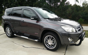 2009 Toyota RAV4 with 18x8 Helo HE845 wheels
