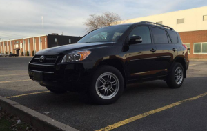 2009 Toyota RAV4 with 17x8 Enkei RPF1 wheels