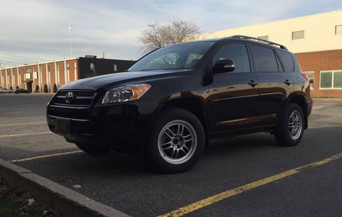 2009 Toyota RAV4 with 17x8 Enkei RPF1 wheels