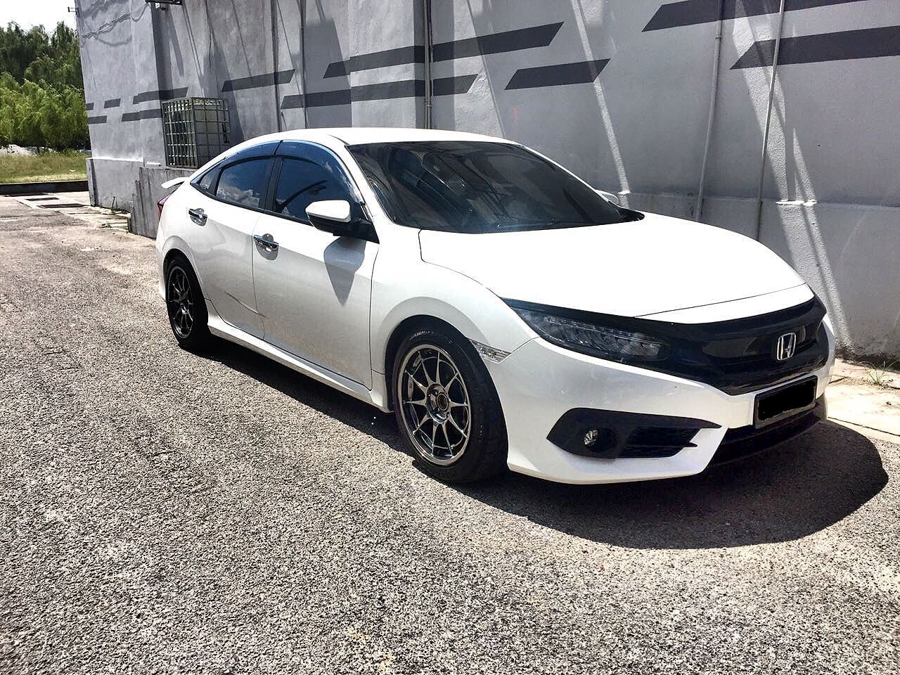 2016 Honda Civic with 17x9 Enkei NT03 wheels