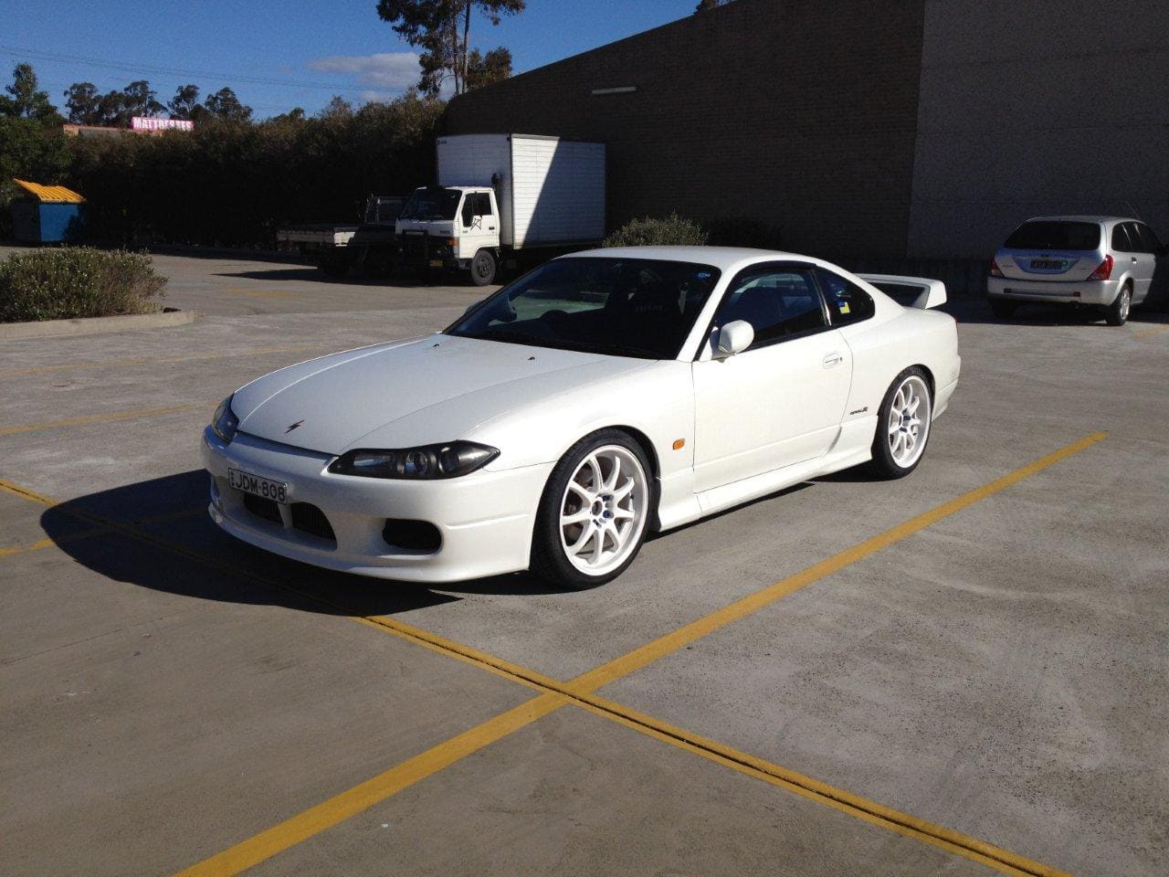 1999 Nissan S15 with 18x8 WORK XD9 wheels