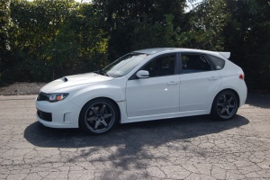 2008 Subaru Impreza WRX STi with 19x9.5 Rays Engineering TE37 wheels