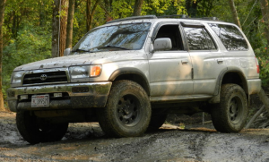 2010 Toyota 4Runner with 17x8 American Racing Teflon Mojave ATX wheels