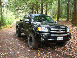 2003 Toyota Tundra with 16x8 Black Type B wheels