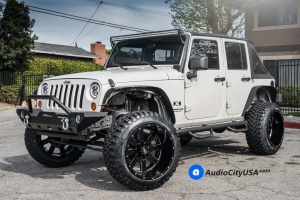2016 Jeep Wrangler with 22x14 Moto 962 wheels