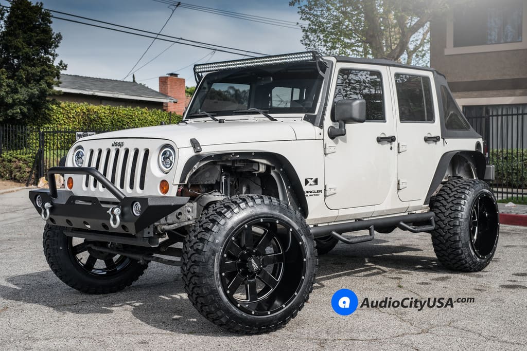 2016 Jeep Wrangler with 22x14 Moto 962 wheels