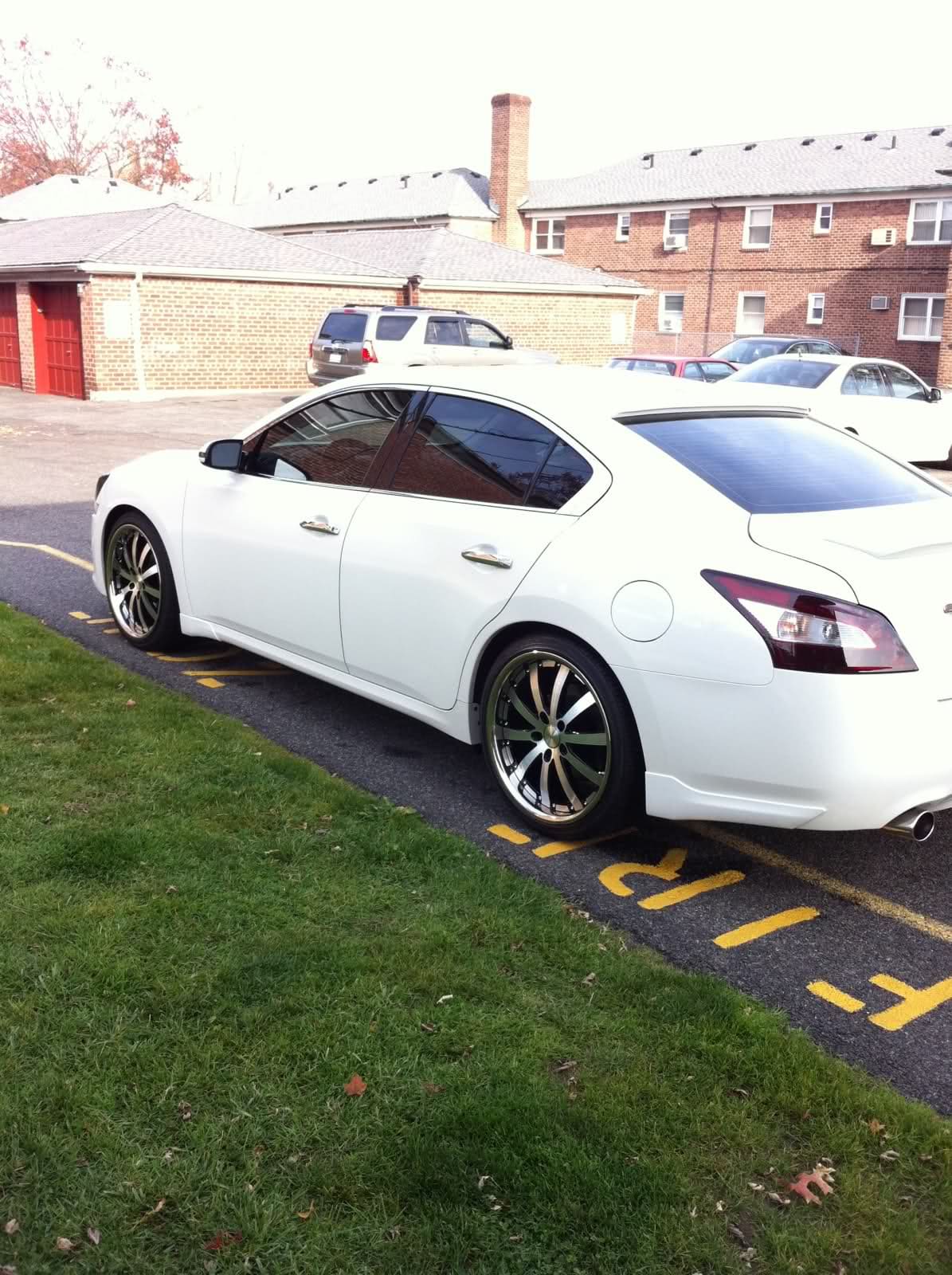 2010 Nissan Maxima with Vossen VVS083 wheels