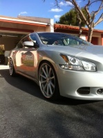 2010 Nissan Maxima with 22x9 Vossen CV1 wheels