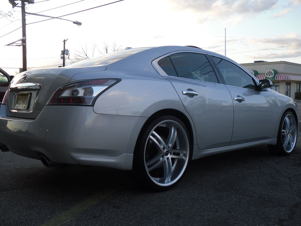 2011 Nissan Maxima with 22x8.5 Status Knighr 5 wheels
