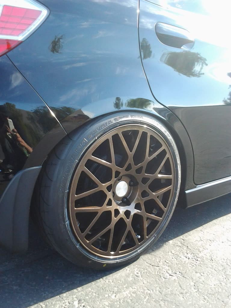 2010 Honda Fit with 18x8.5 Rotiform BLQ wheels