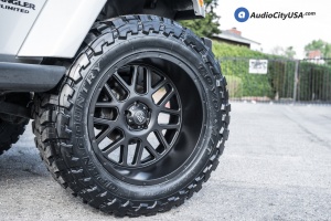 2015 Jeep Wrangler with 22x12 XD XD820 Grenade wheels