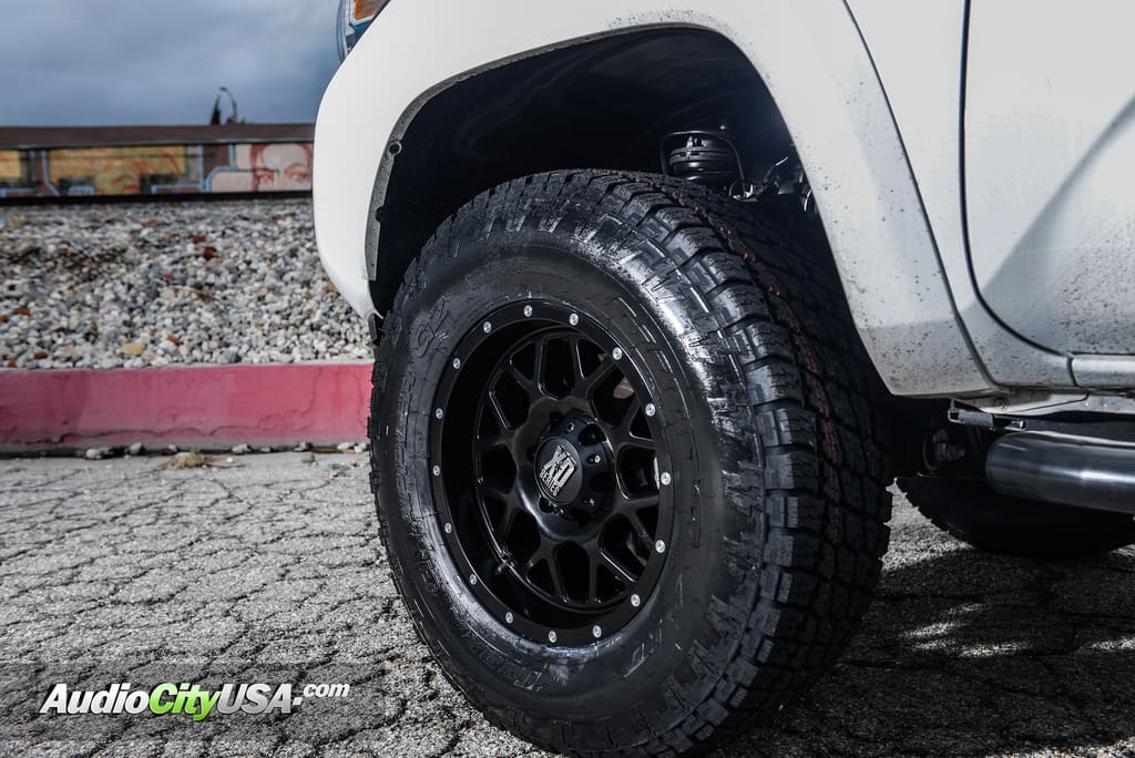 2016 Toyota Tacoma with 17x9 XD Grenade 820 wheels