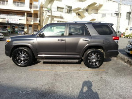 2011 Toyota 4Runner with 20x9 KMC Hoss XD795 wheels