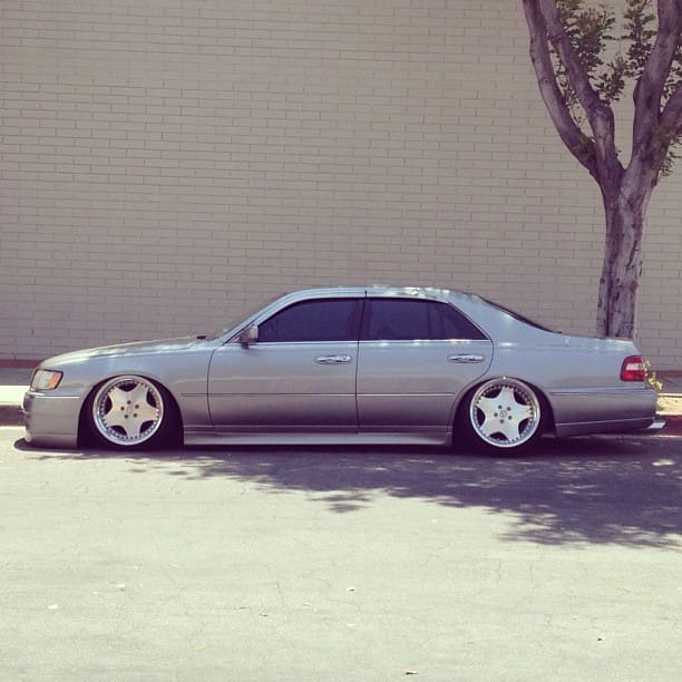 1999 Infiniti Q45 with 19x10.5 Work Ryver wheels